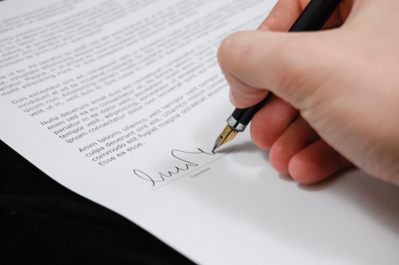 person signing document